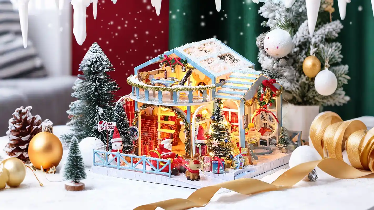 DIY Christmas Night miniature dollhouse with festive decorations, including Santa Claus, reindeer, gifts, and a lit Christmas tree.