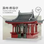 The Drunk Weng Pavilion model is constructed using the traditional mortise - and - tenon technique. It is made from building blocks, representing a popular form of Chinese toys. The intricate design and vibrant colors showcase the charm of traditional Chinese architecture.