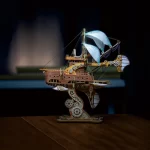 Completed 3D wooden puzzle of a fantastical spaceship with intricate details, gears, and sails.