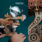 3D wooden puzzle of a fantastical spaceship, highlighting the Fixed Slot component in assembly, with detailed gears and sails.
