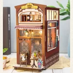 An intricately - designed Coffee House DIY book nook kit with a warm and inviting aesthetic.