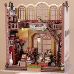 A beautifully detailed DIY miniature house featuring a European vintage bookstore design, with warm lighting, intricate bookshelves, and a cozy reading atmosphere.