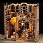 A beautifully detailed DIY miniature house featuring a European vintage bookstore design, with warm lighting, intricate bookshelves, and a cozy reading atmosphere.