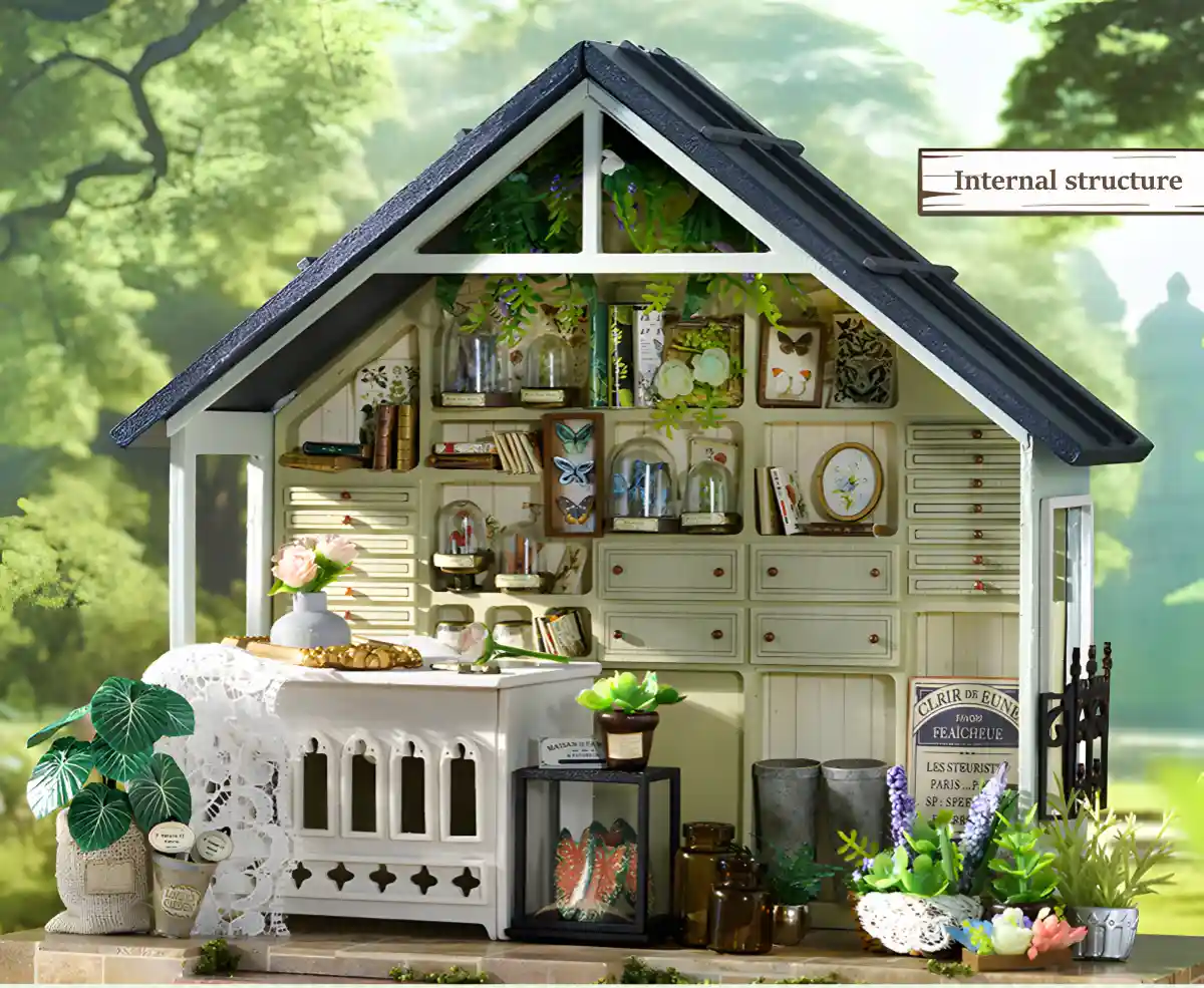 Open view of the plant dollhouse highlighting its internal structure and various miniature scenes. Text overlay "Internal structure".