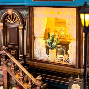 Zoomed-in detail of the Cuckoo House's miniature shop window with internal lighting.