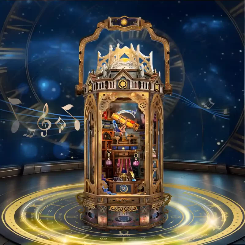 A fully assembled, ornate 3D wooden puzzle shaped like a golden lantern, with an illuminated interior revealing a miniature observatory with a telescope, all set on a base with zodiac signs, against a dark blue starry background with musical notes.