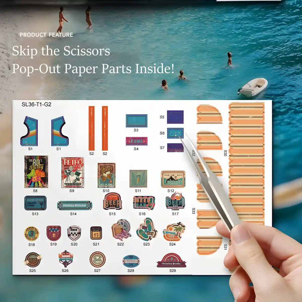 A sheet of numbered pop-out paper parts next to tweezers, with a background of ocean water and people swimming.