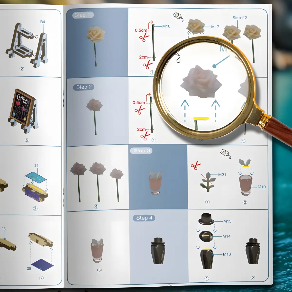 An open, colorful instruction manual showing steps to create miniature roses and other components, with a magnifying glass above.