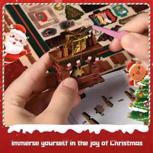 Hands assembling a miniature fireplace with tiny gifts and stockings for a Christmas Shop DIY Book Nook Kit, with assembly instructions visible.