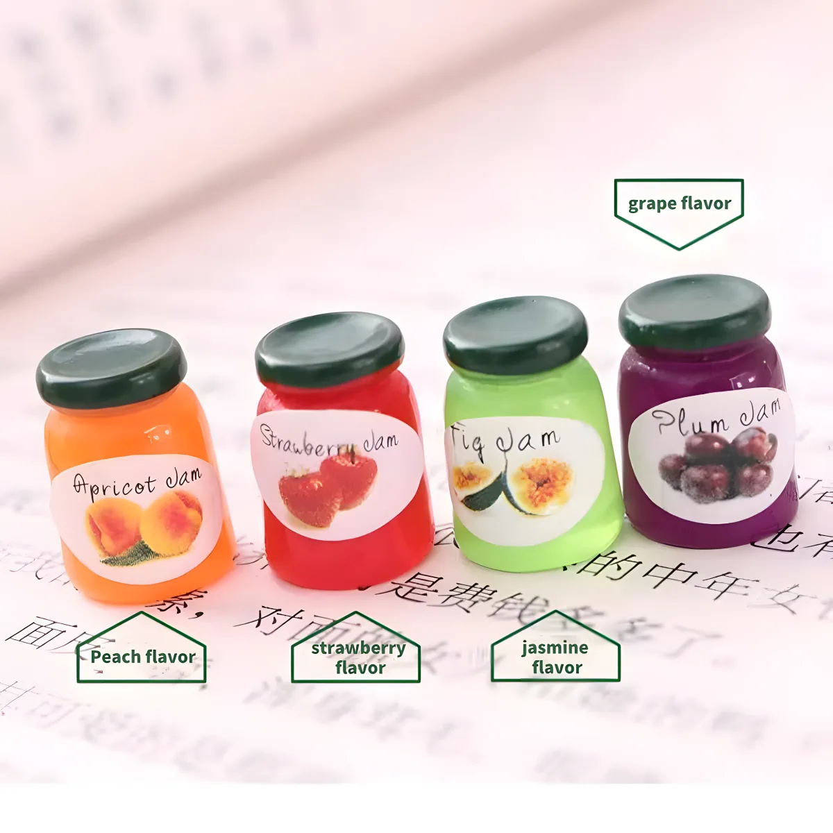 Four miniature jam jars: apricot, strawberry, fig, and plum jam jar miniatures.