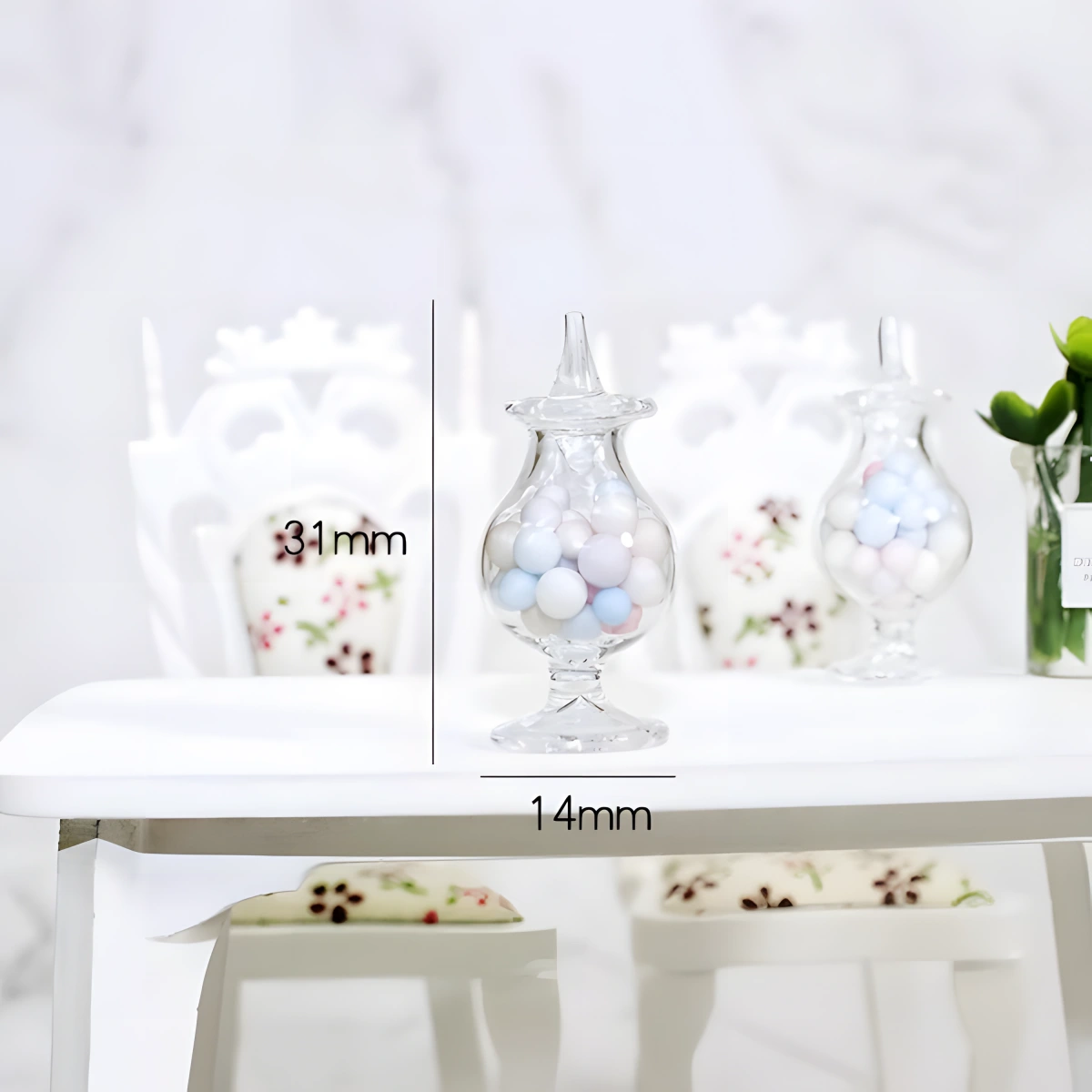 Rofuntime Mini Candy Display Jar. A miniature glass jar, 31mm tall and 14mm wide, filled with pastel candy. The jar has a classic display jar shape with a lid. The image highlights the product's small scale and includes its dimensions.