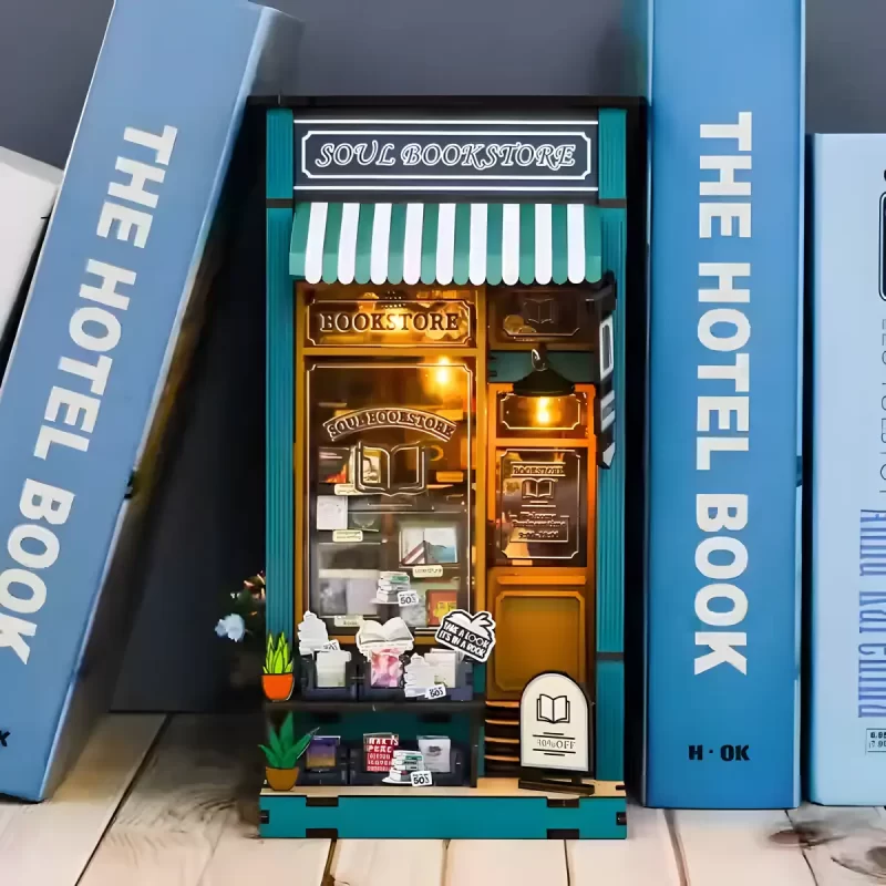 Bookshelf insert, Soul Bookstore book nook, displayed between large books.