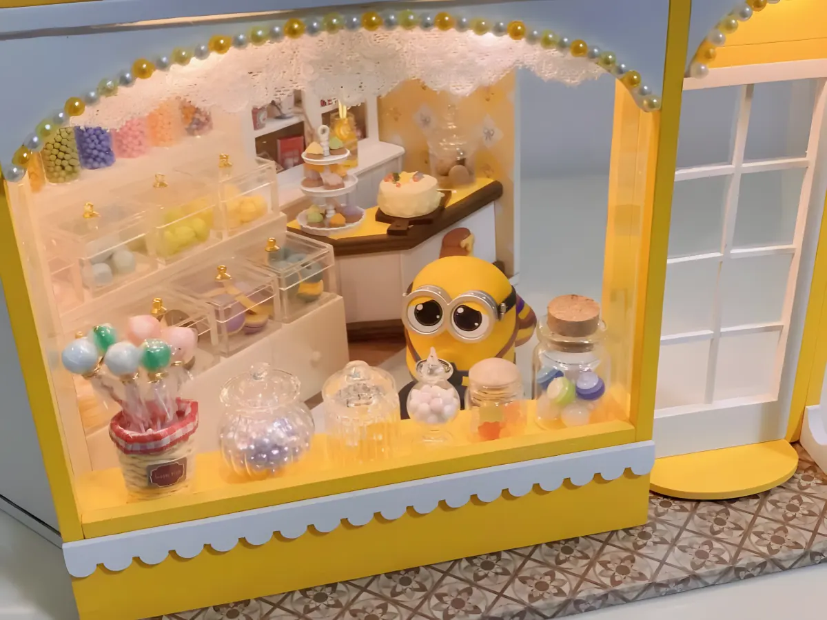 The Sweet House DIY miniature dollhouse makeover, Minion-themed candy shop, cute Minion figure, dollhouse customization ideas.