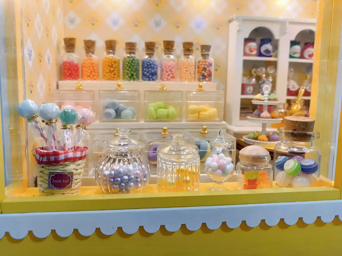 Miniature candy shop makeover, lighting effects, colorful miniature sweets, dollhouse customization ideas.