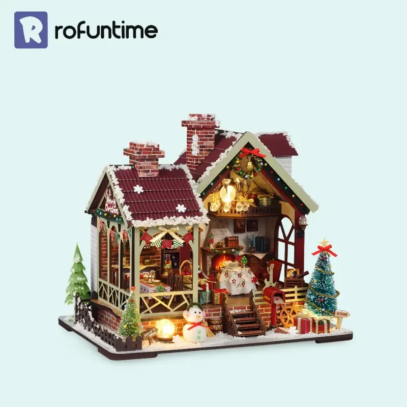 Assembled Rofuntime Christmas Miniature House with lights, a snowy scene, and detailed decor.