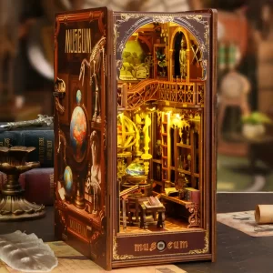 Angled view of Century Museum book nook, dinosaur skeleton, illuminated interior.