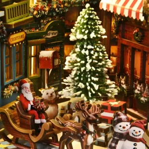 Miniature Santa Claus scene with reindeer, snowman, and a snowy Christmas tree.