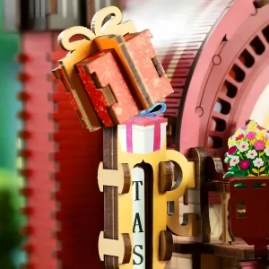 A detailed macro shot of a decorative sign on the Dessert Workshop wooden puzzle.