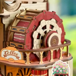 Detailed view of the mechanical grinding wheel on the Dessert Workshop 3D wooden puzzle.