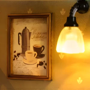 Close-up of the miniature café lighting and wall art.