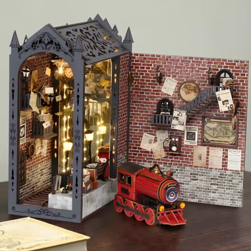 Fantasy Train Platform book nook opened from the side, with the train model placed outside.