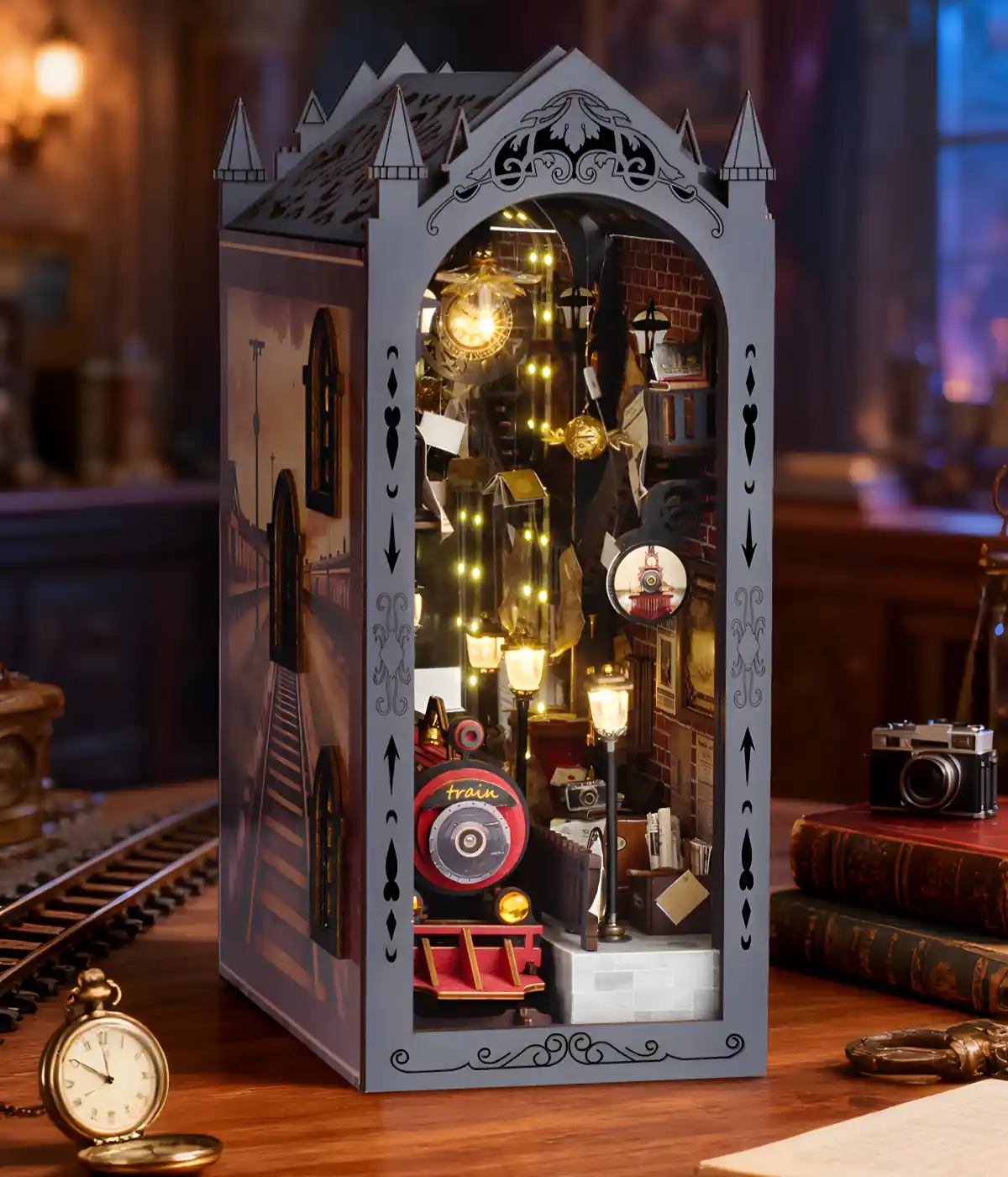 Assembled Fantasy Train Platform book nook with illuminated, retro décor train station details.