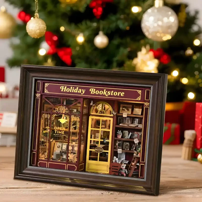 Holiday Bookstore book nook kit on a table, cozy holiday décor.
