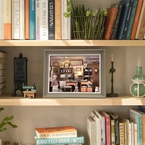 Lily Sewing Shop book nook on a bookshelf, a vintage sewing book nook display.