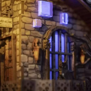 Magic Library 3D Wooden Puzzle with glowing windows, a cat, and a welcome sign.