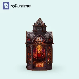 Illuminated Spire of the Wyrm book nook, a dramatic Gothic fantasy book nook shelf insert.