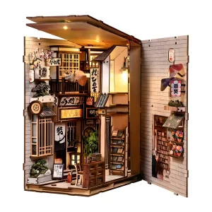 Healing Japanese book nook kit with warm ambient lighting.