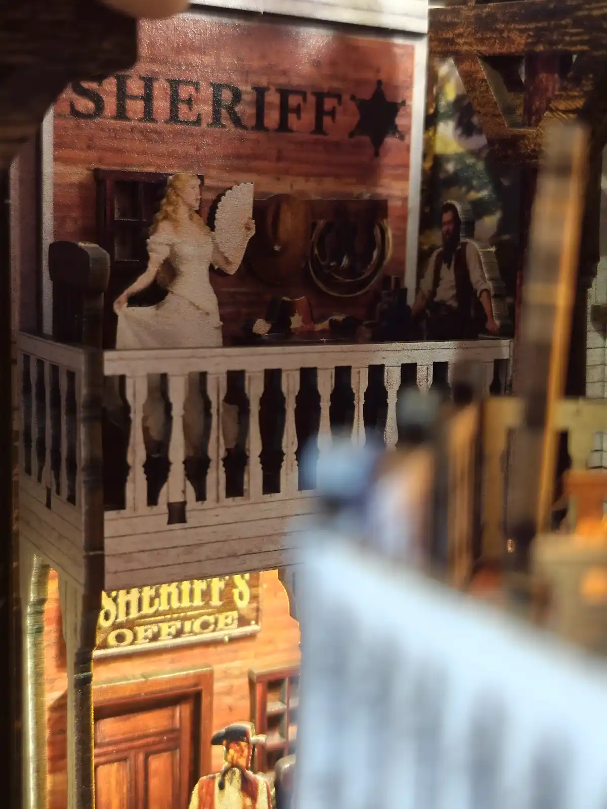 Close-up of a Wild West book nook balcony scene above the Sheriff's office.