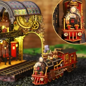 Full display and close-up of the steam train miniature in the Zero Platform book nook.