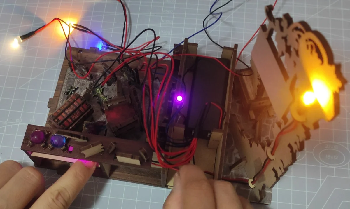 Installing LED lights in a DIY book nook, how to build a book nook step by step.