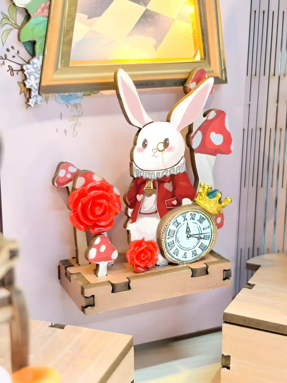 The White Rabbit character in an Alice in Wonderland book nook holding a pocket watch.