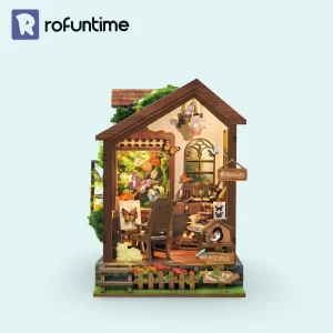 The complete Rofuntime Butterfly House DIY Book Nook Kit; a charming wooden miniature butterfly house and countryside studio diorama.