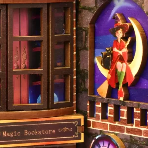 A detailed close-up of the Magic Alley book nook, showing a witch on a moon next to the glowing "Magic Bookstore" sign in a fantasy world.
