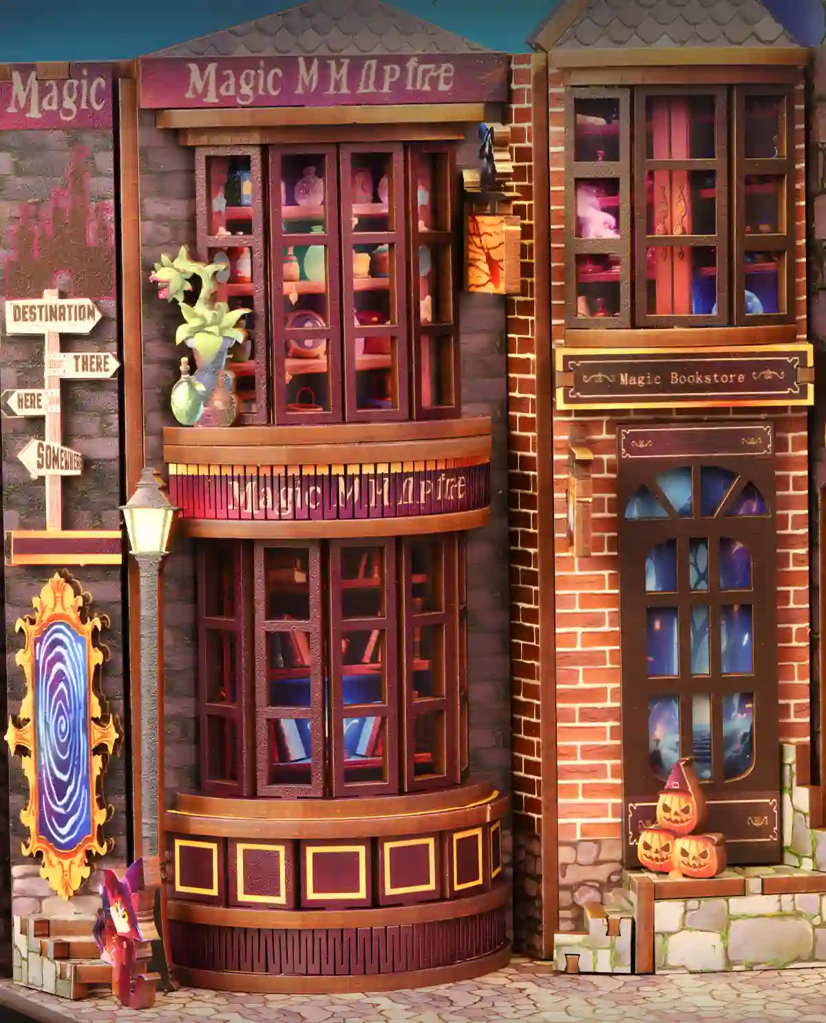 A close-up of the wizard shops in the Magic Alley DIY Book Nook, featuring detailed storefronts, glowing signs, and a magical portal.
