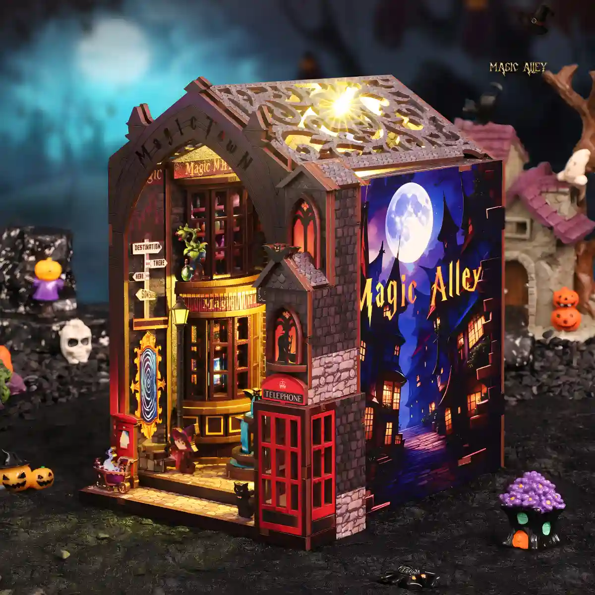 A three-quarters view of the illuminated Magic Alley DIY Book Nook Kit, showing the depth of the fantasy world and its gothic details.