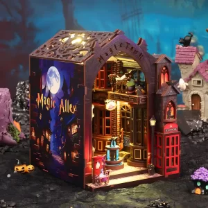 A side view of the Magic Alley book nook, showcasing the illustrated side panel and the glowing secret alley with its charming wizard shops.