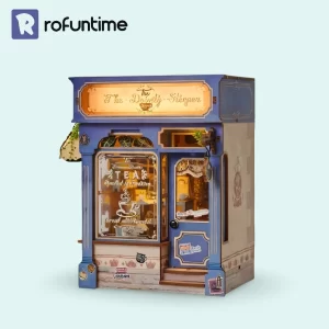 Assembled The Dainty Steeper book nook kit, a blue English vintage tea shop with a lit sign.