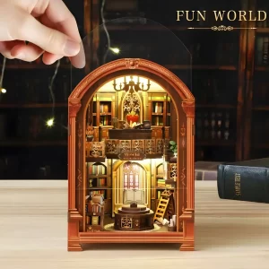The completed World Bookstore book nook with its clear acrylic dust cover, a protected European library miniature.