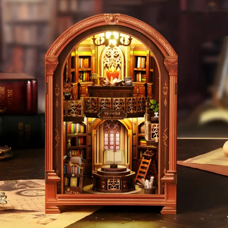 An illuminated front view of the World Bookstore book nook, showcasing its detailed, multi-level library diorama design.