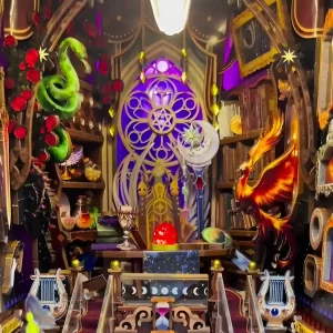 The upper chamber of the Zodiac Fantasy book nook, featuring a phoenix, serpent, and purple stained-glass window; a complete Astrological Craft Kit.