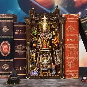 The completed Zodiac Fantasy DIY Book Nook Kit displayed on a bookshelf, glowing between other books, creating an astrology-themed insert.