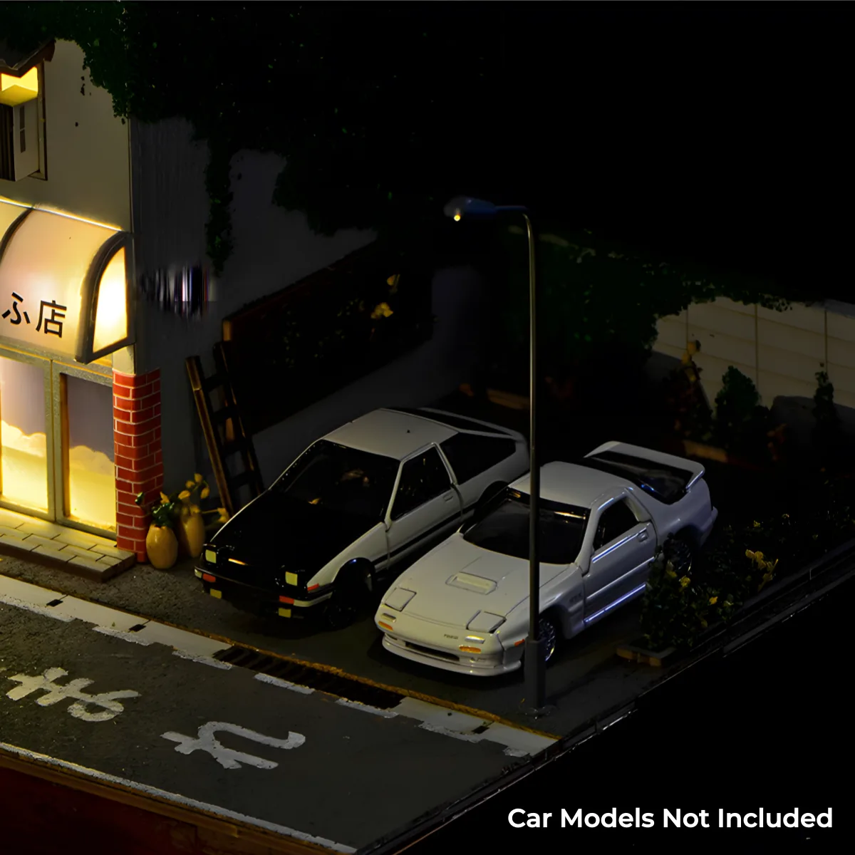 Night Fujiwara Tofu Shop Replica yard, parked authentic Initial D car models, street lamp.