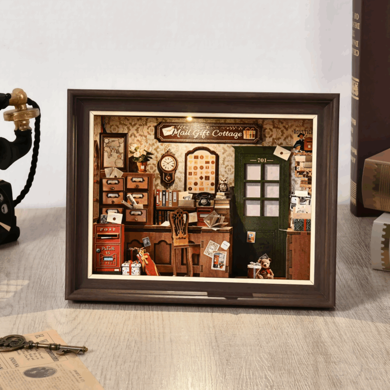 Rofuntime Mail Gift Cottage book nook on a table, next to an antique phone.