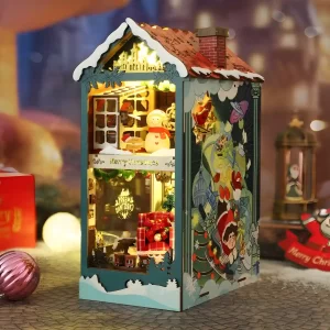 Fully assembled illuminated Merry Christmas book nook with two levels and festive side art.