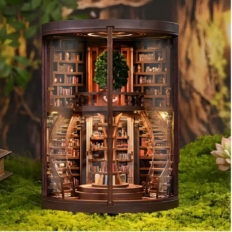 Symmetrical front view of the lit Wisdom Rings Bookstore book nook and central tree-shaped bookshelf.