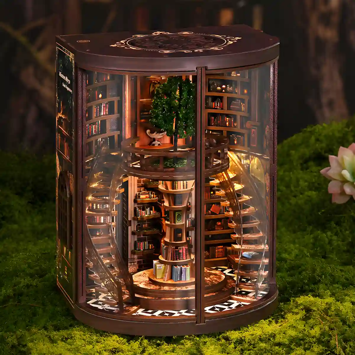 Side view of the illuminated Wisdom Rings Bookstore book nook, showing curved glass and staircase details.